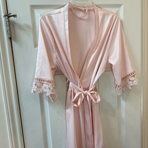 Silk like pink robe.